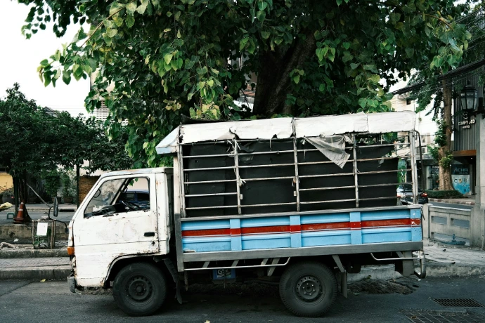 a truck is parked on the side of the road
